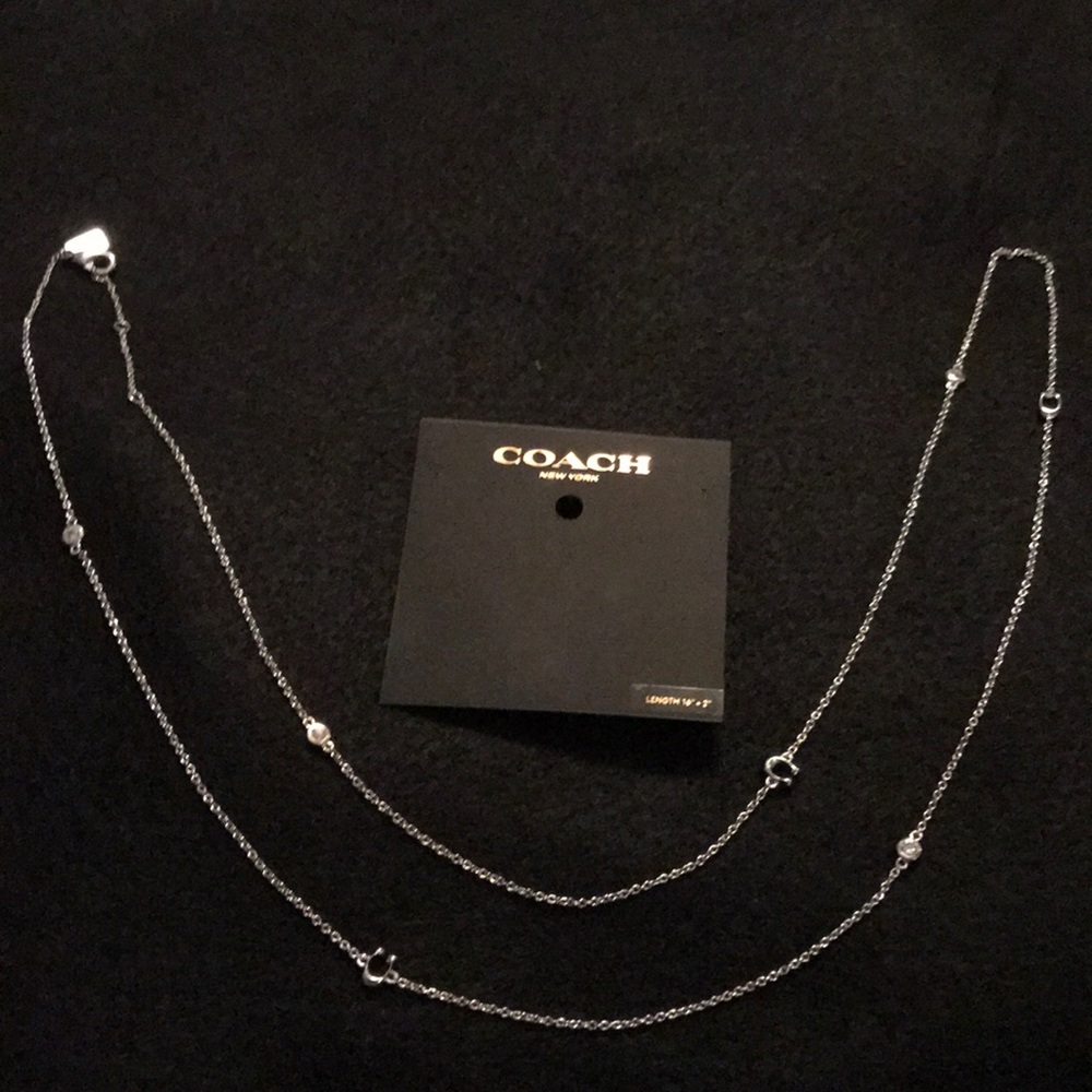 Coach signature long necklace.